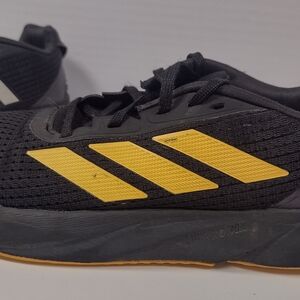 Adidas Black Running Shoes with Yellow Stripes